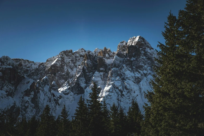 a beautiful mountain with some snow on it