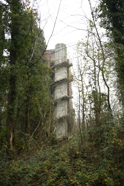 a very tall tower with a bunch of windows in the middle