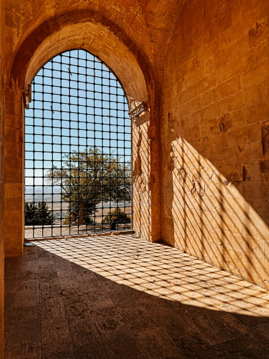 a very long and narrow room with some big windows