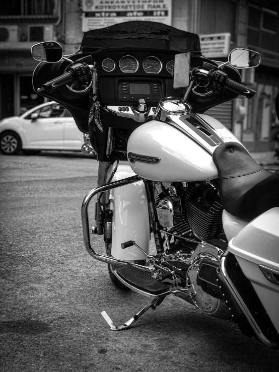 a parked motorcycle on a city street