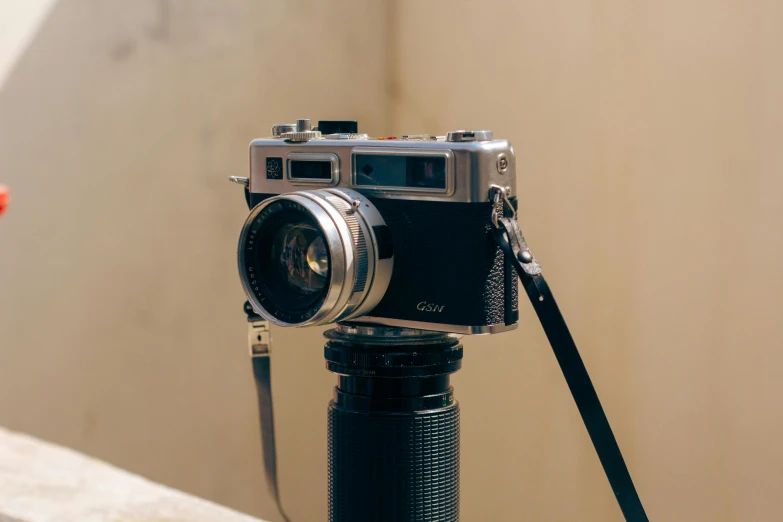 a close up of a camera on a tripod