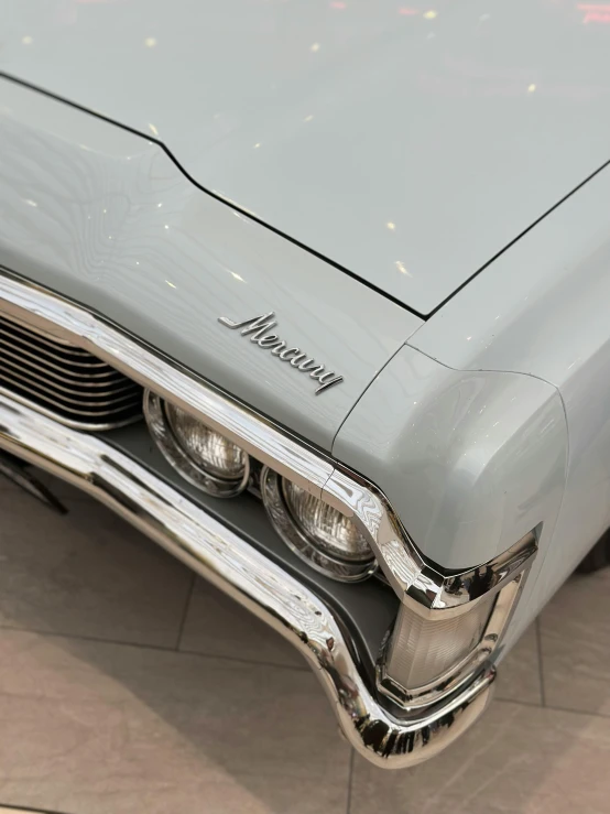 an image of a silver car headlight