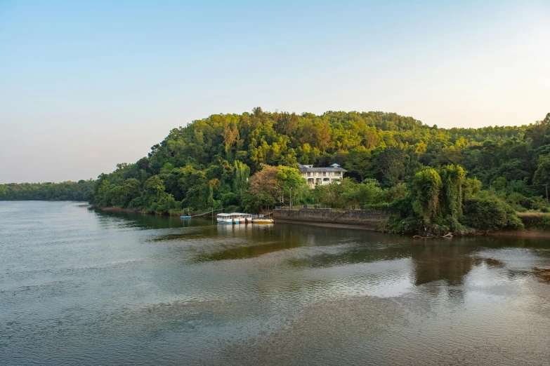 there is a small boat on the river