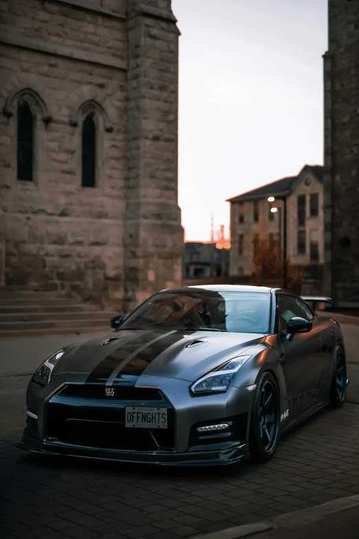 a car parked in front of some old buildings