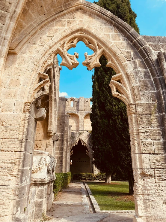 the archway to the castle is wide and open