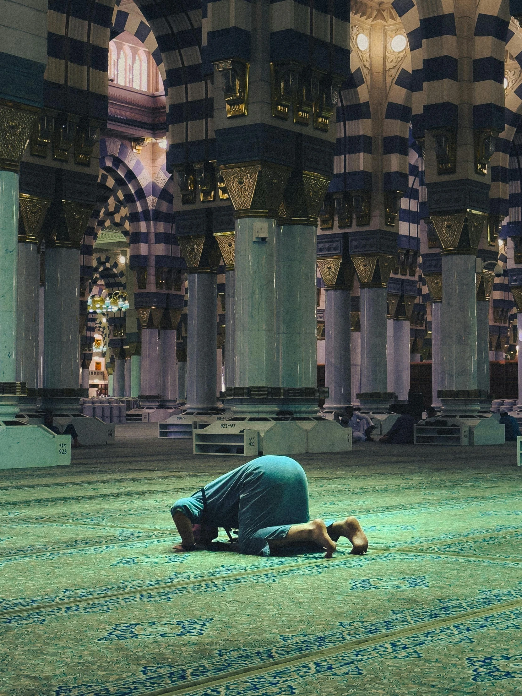 a person laying on a rug in the middle of a floor