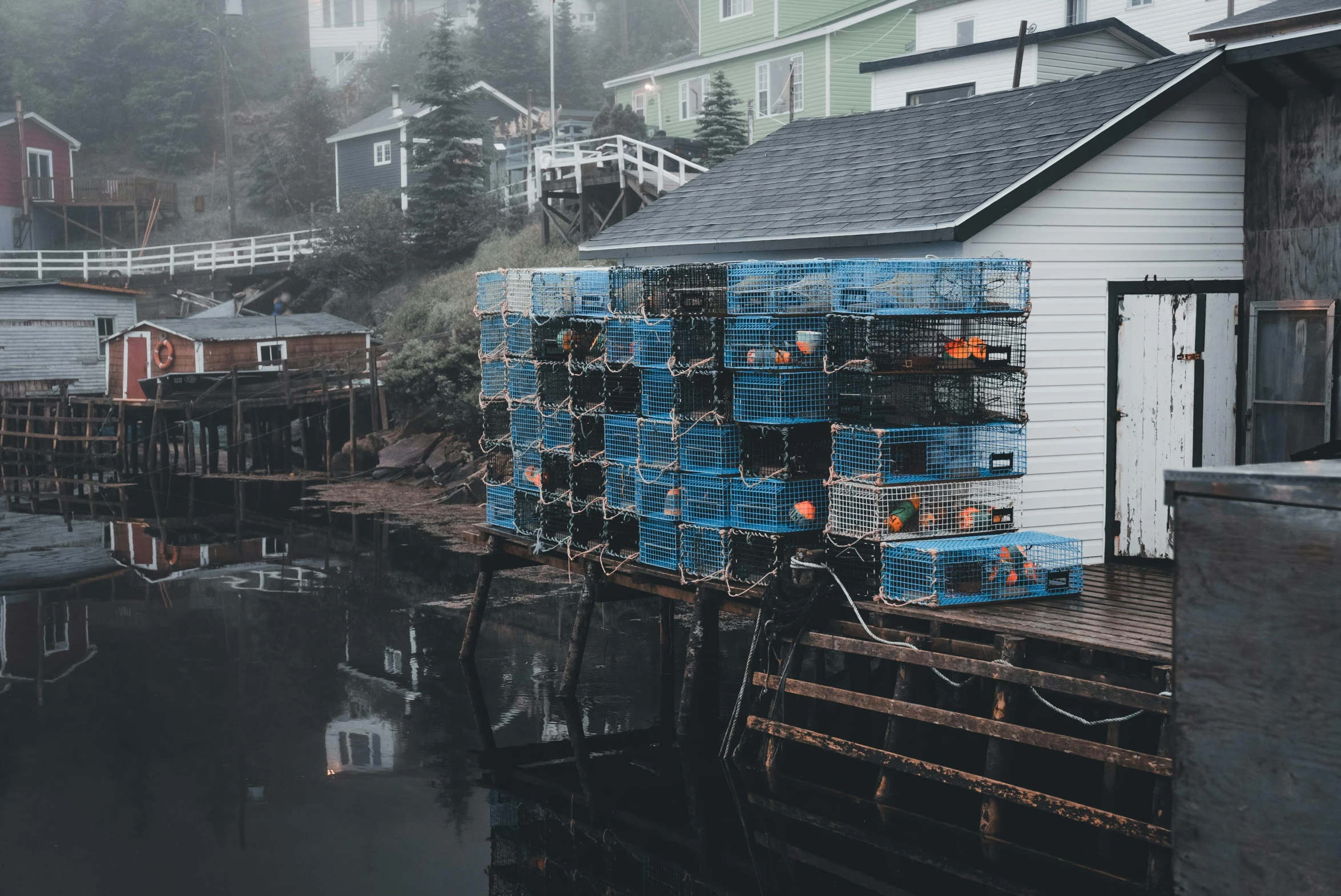 a house is next to a small lake