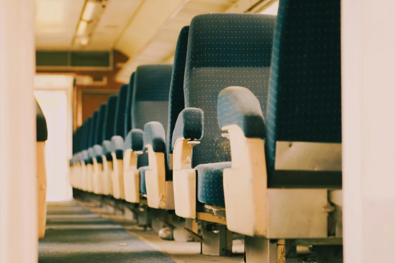 an empty train sitting in a train station