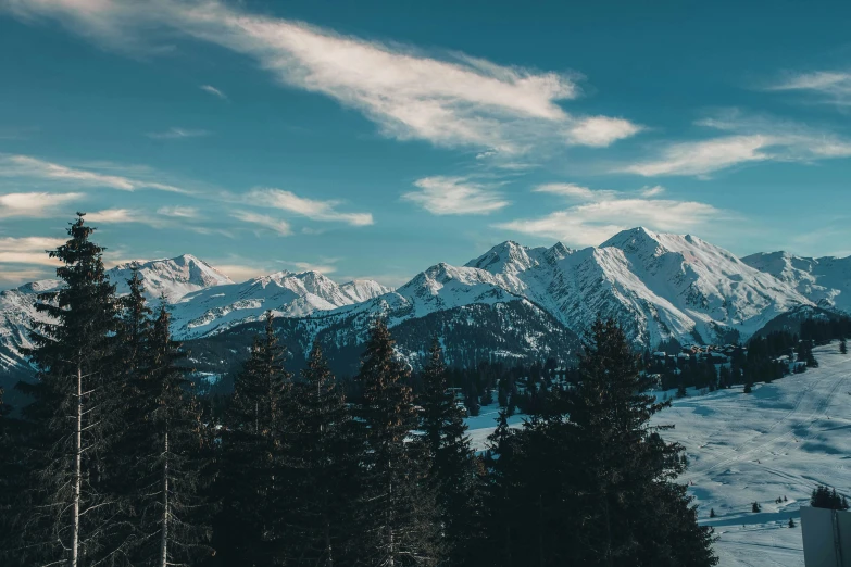 a mountain with some snow in the air