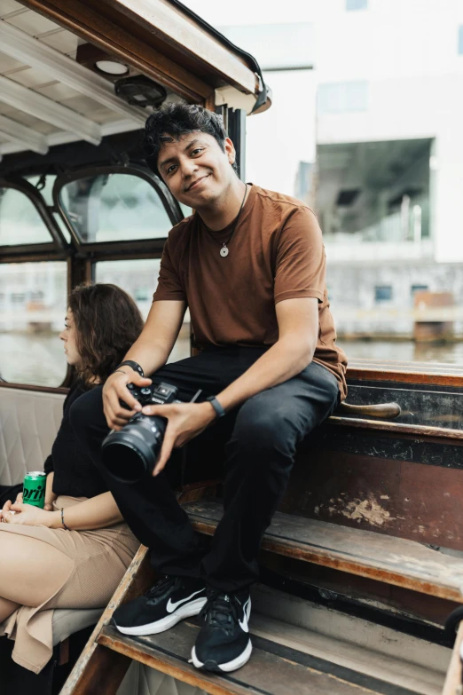 the man and woman are sitting in a truck