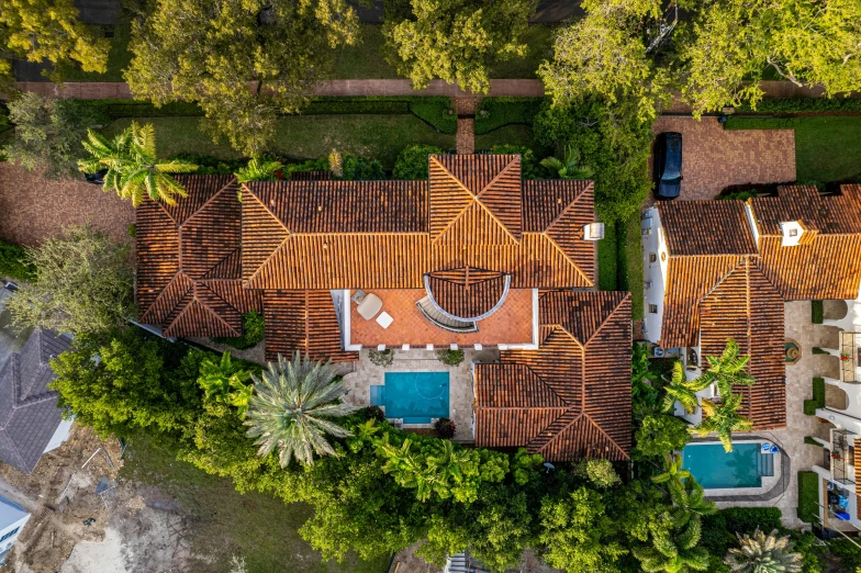 an aerial view of the roof tops of this home