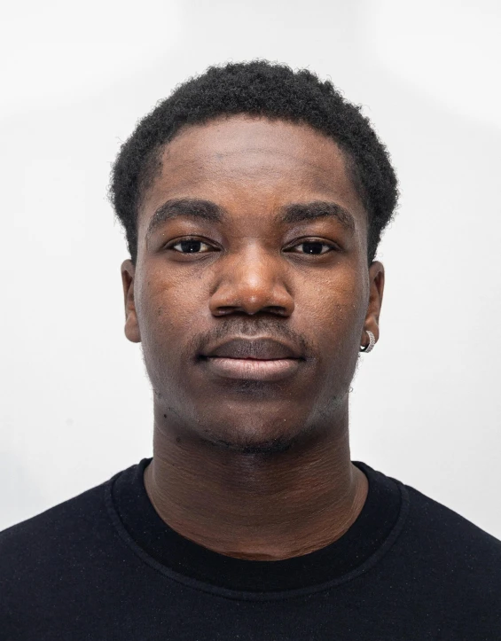 an african american man wearing a black shirt