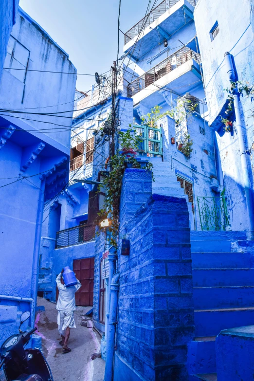 a narrow street in an indian village