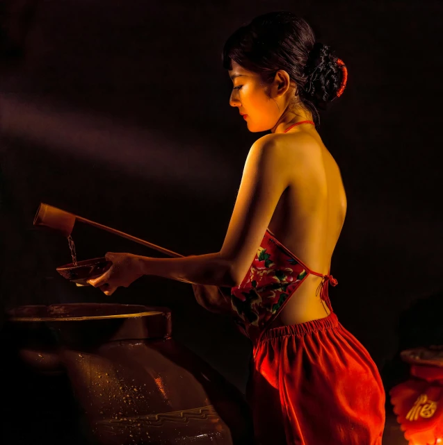 woman in red dress cooking food on stove