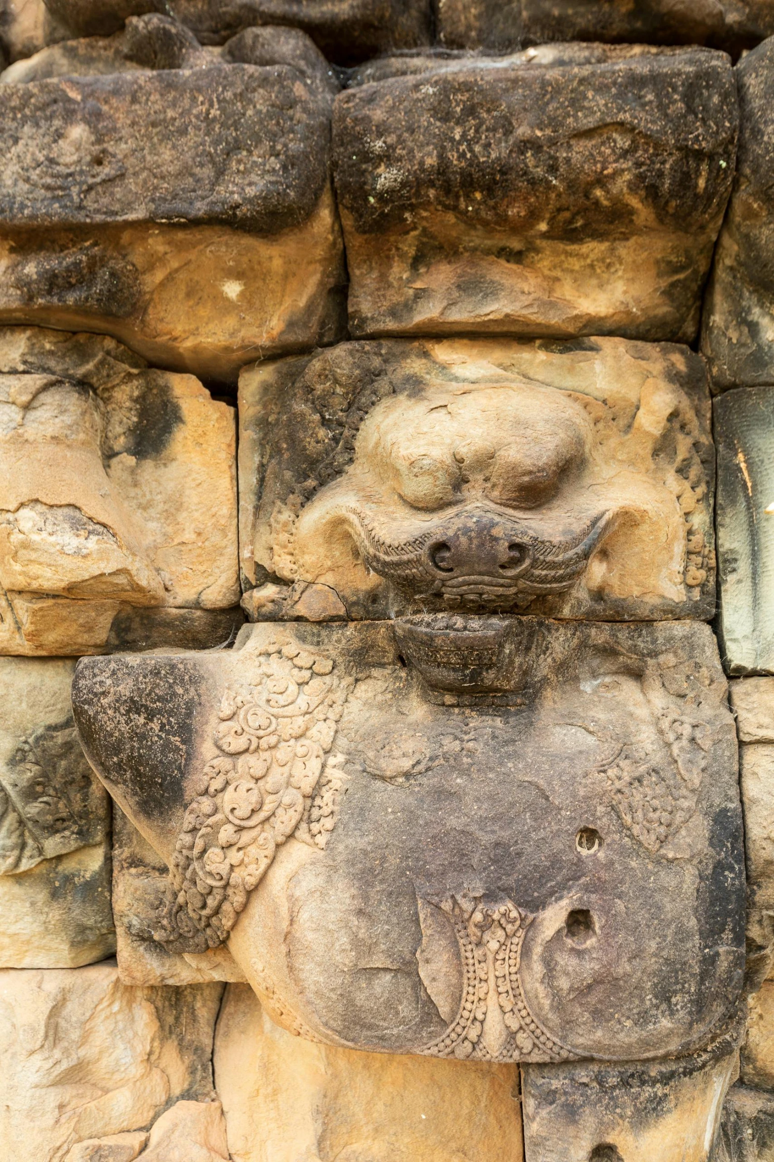 a carved object on a stone wall in ancient egypt