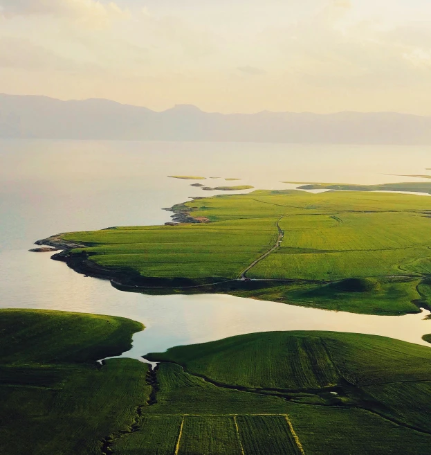 an aerial po of some water and land