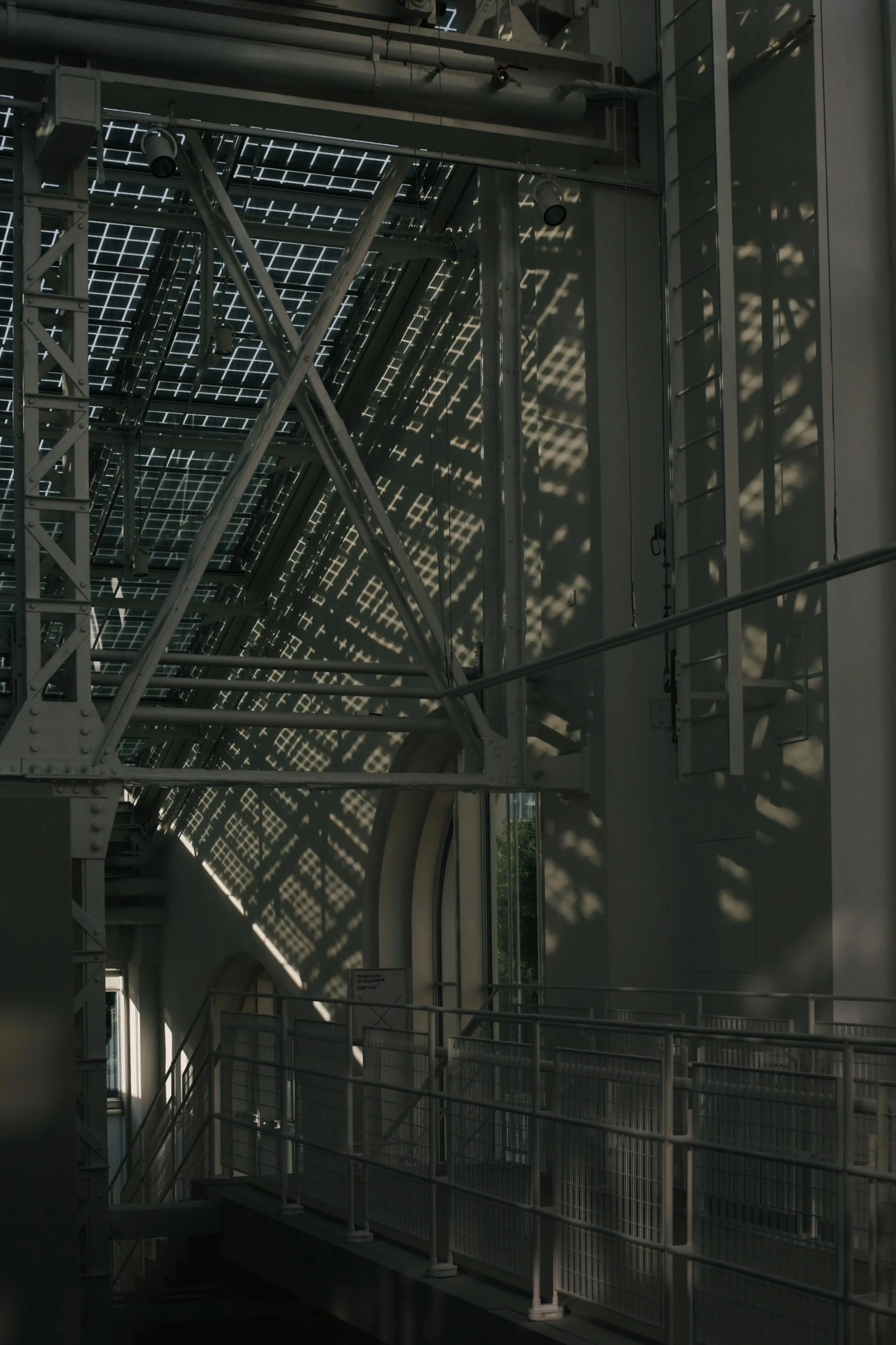 shadow and the roof of an enclosed building