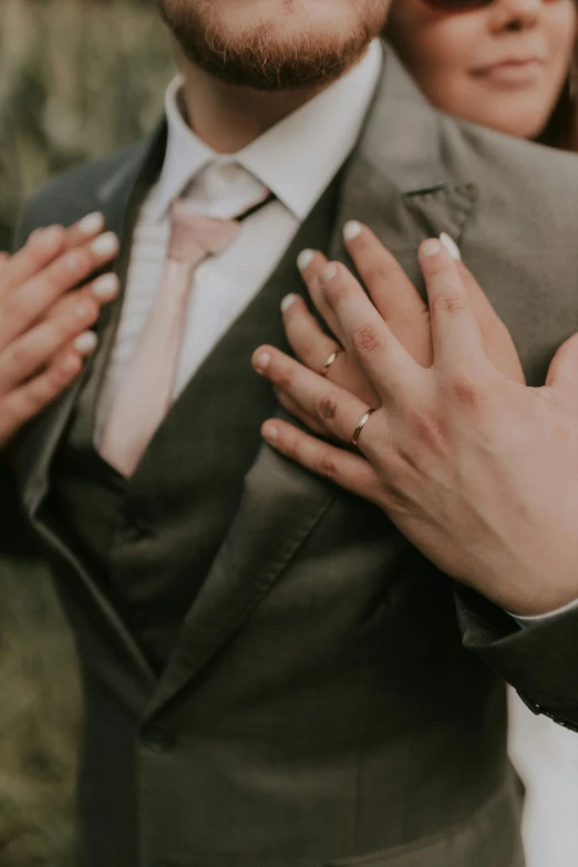 the bride and groom are posing together for the camera