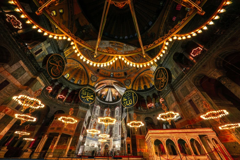 the interior of a church with brightly lit decorations