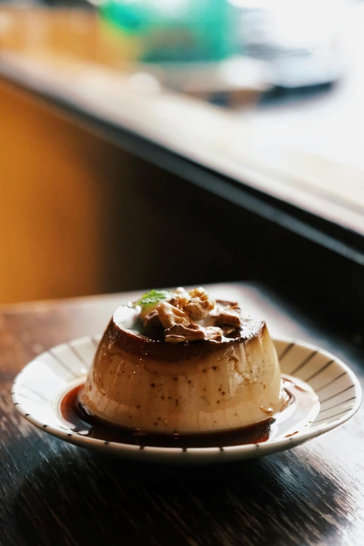 a dessert served on a plate at a restaurant