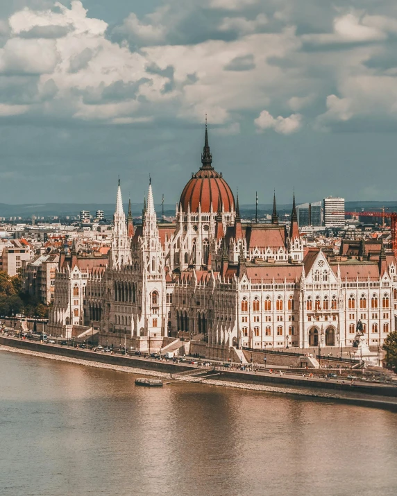 the skyline is full of beautiful buildings along the river