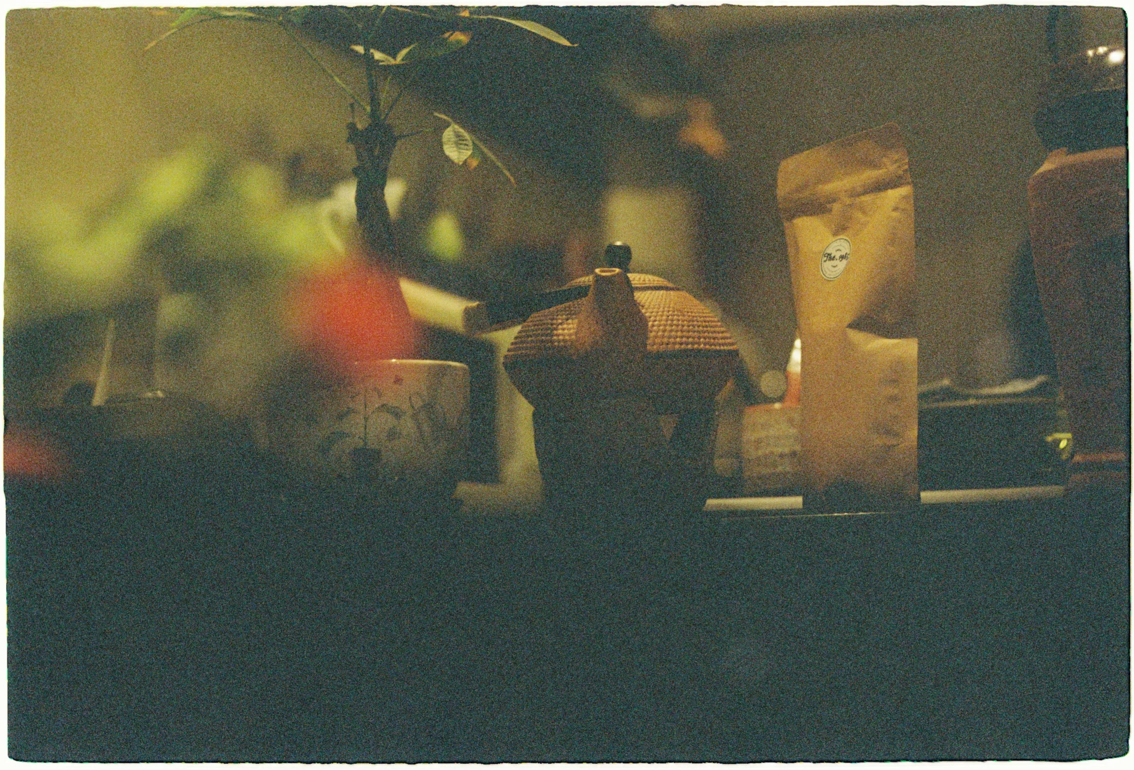 a blurry po of a counter top and some paper bags