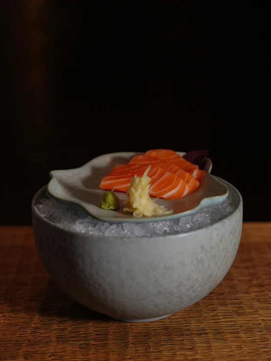 a large bowl containing several seafood pieces