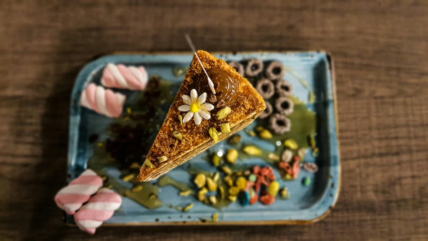 a partially eaten piece of food on a blue plate