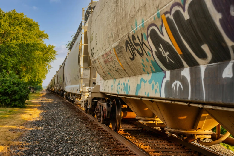 an old train car with graffiti all over it