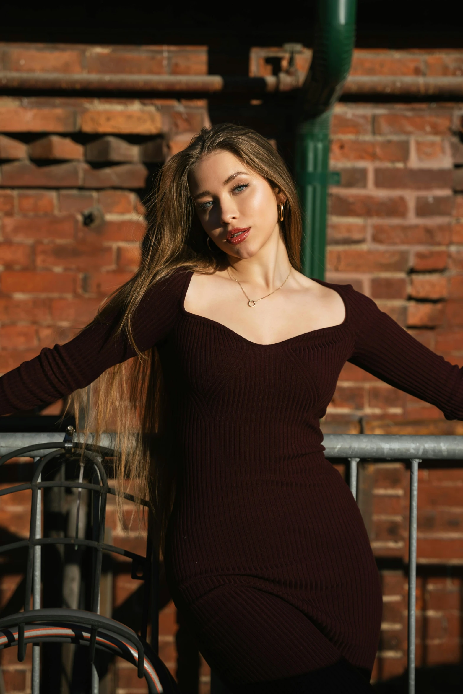 an attractive woman posing with long hair