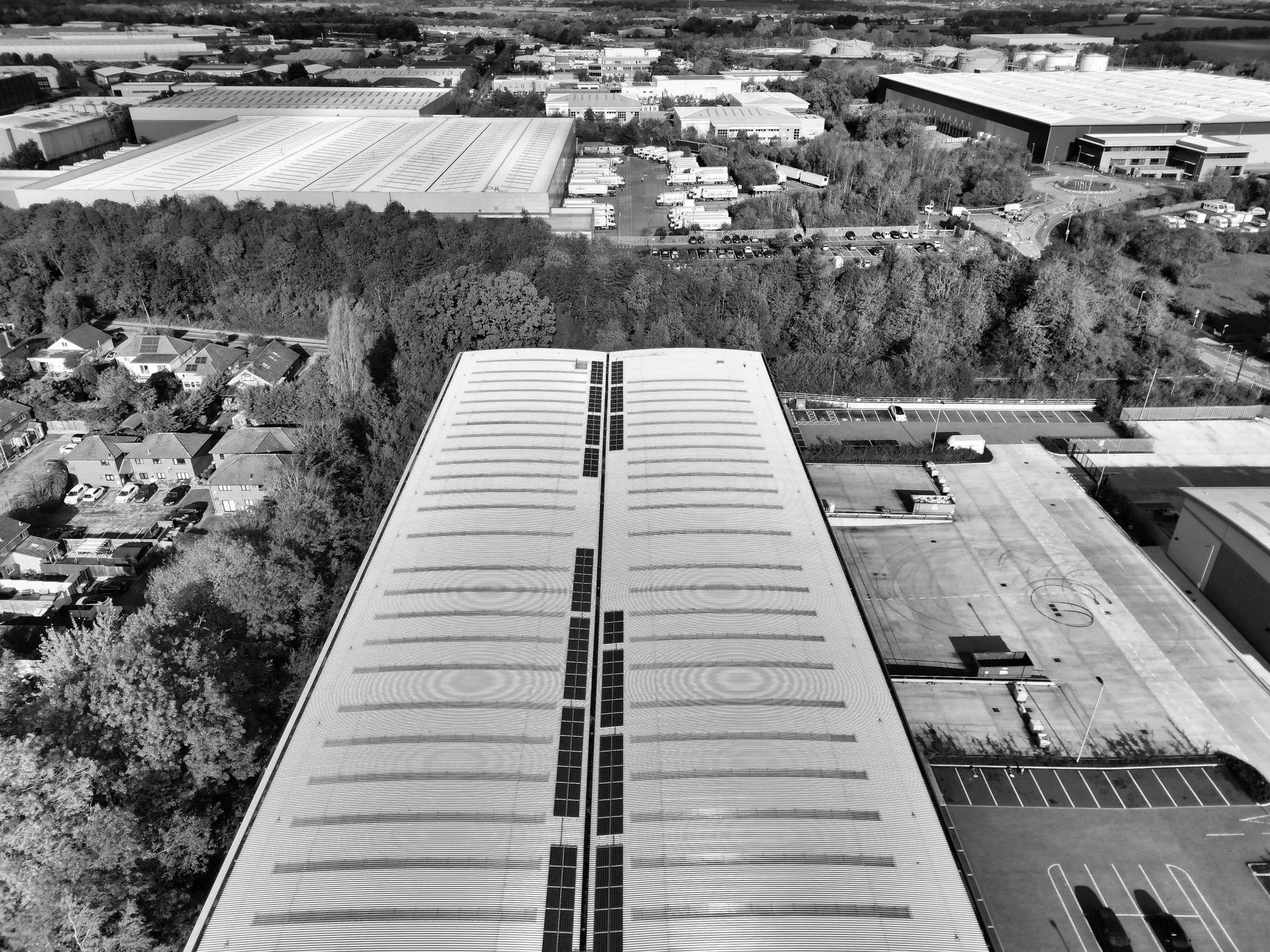 the overhead view of a building with lines in the ground