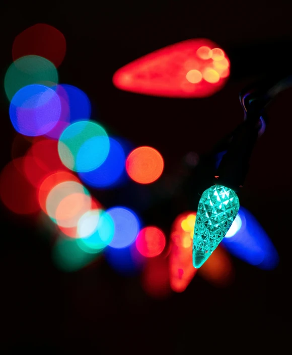 a close up of a stop light with many lights on