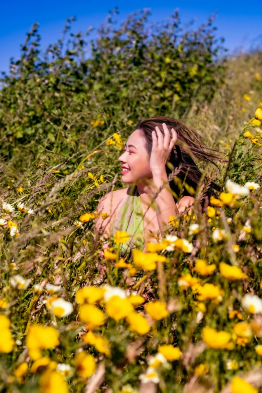 a  is hiding in the grass