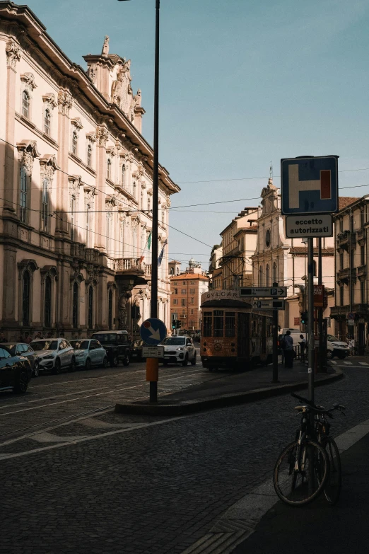 an old trolley traveling down a street