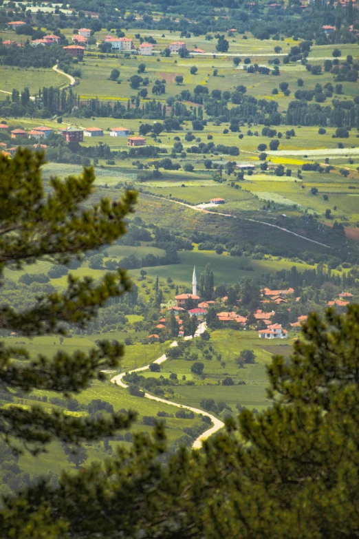 view from mountaintop with village in distance