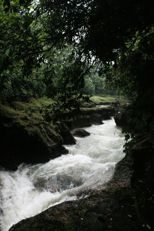 the river is flowing into a narrow channel