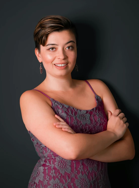 a woman posing in a tank top