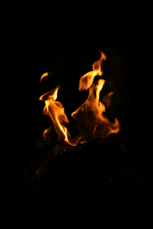 flames in the dark with a black background