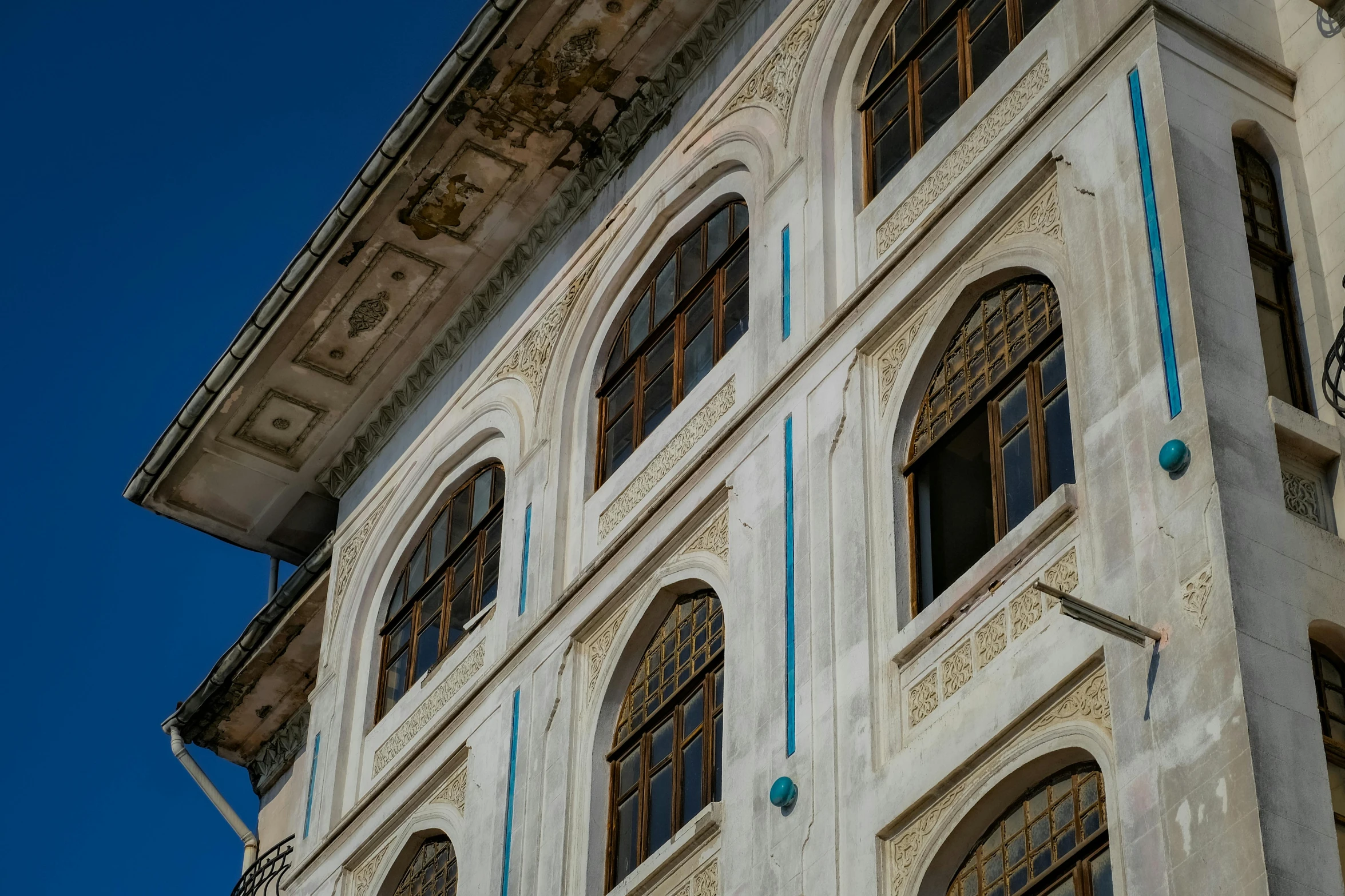 the front and side windows of a white building