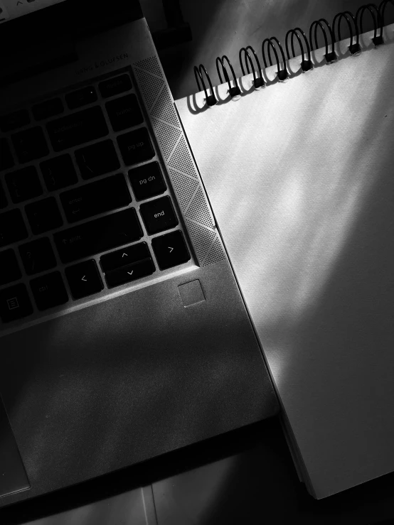 a desk with a computer on top of it