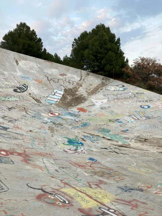 a guy on a skateboard in the middle of an obstacle course