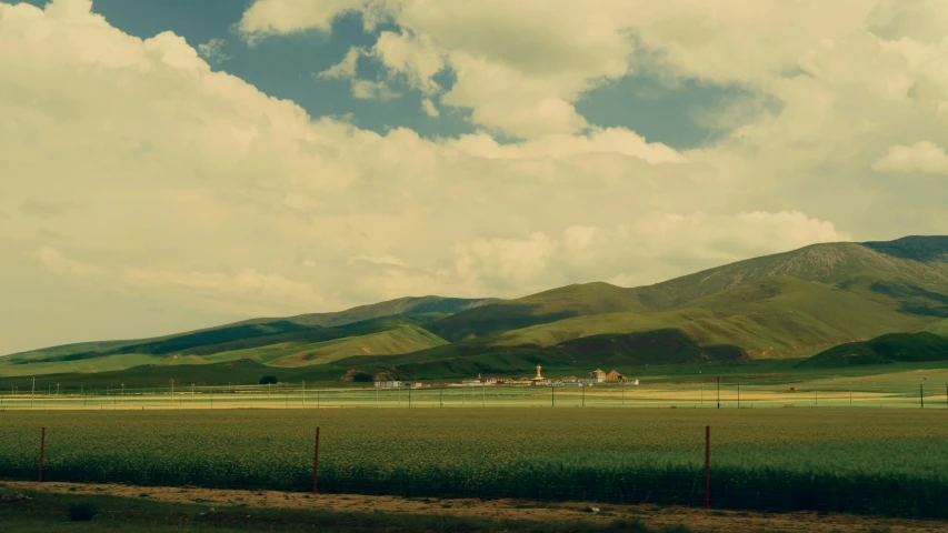 view of mountain from land area near roadway