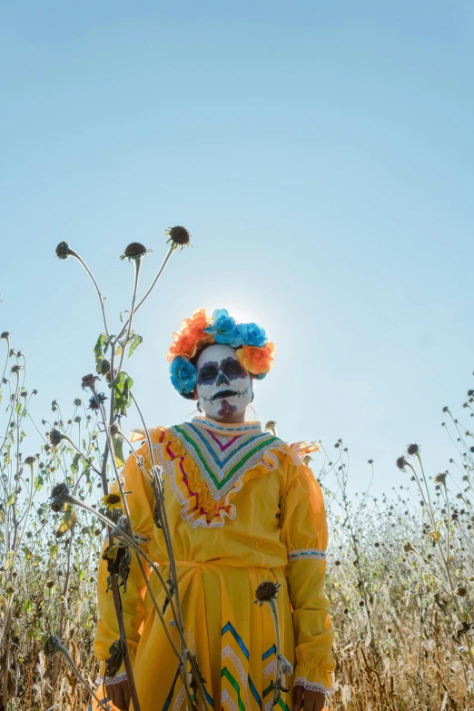 a man in a costume with sun shining behind him