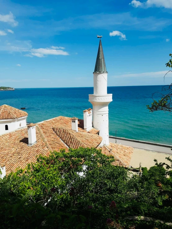 a small church in the middle of the ocean