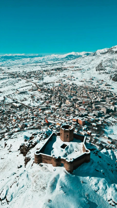 a small city that has been partially covered by snow