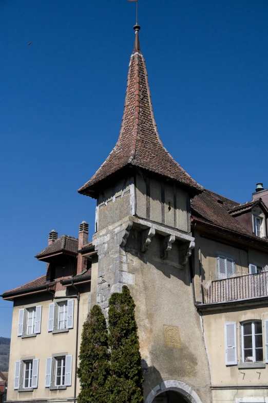 an old stone building with a bell tower