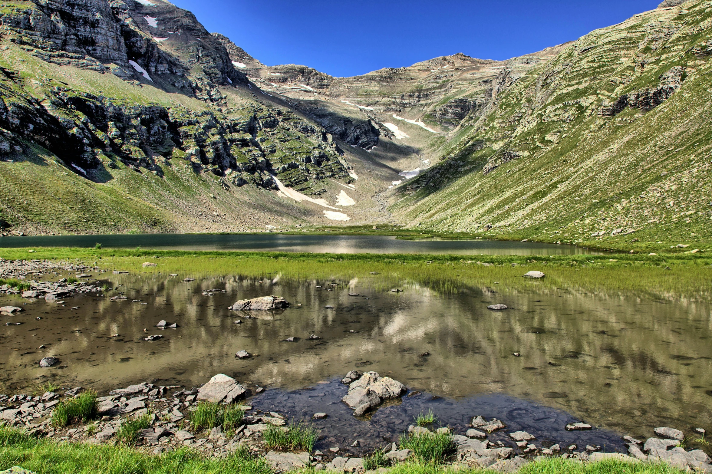 a body of water that is surrounded by rocks