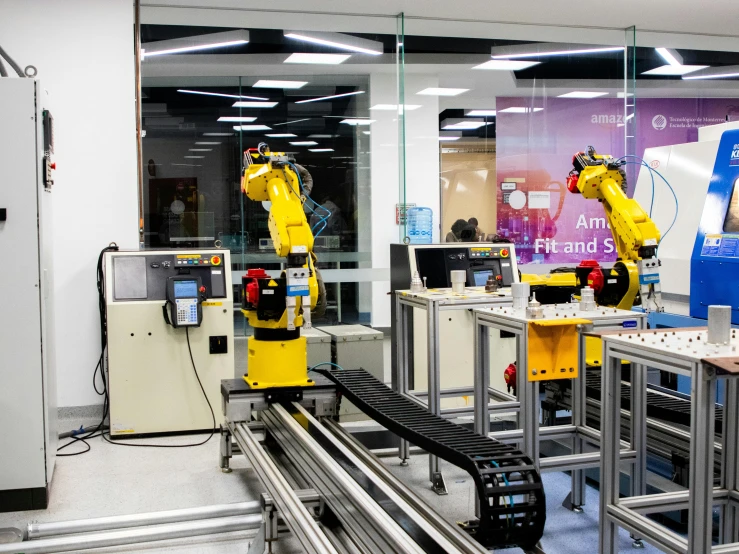 an automated assembly line at a factory, in the process of being worked on