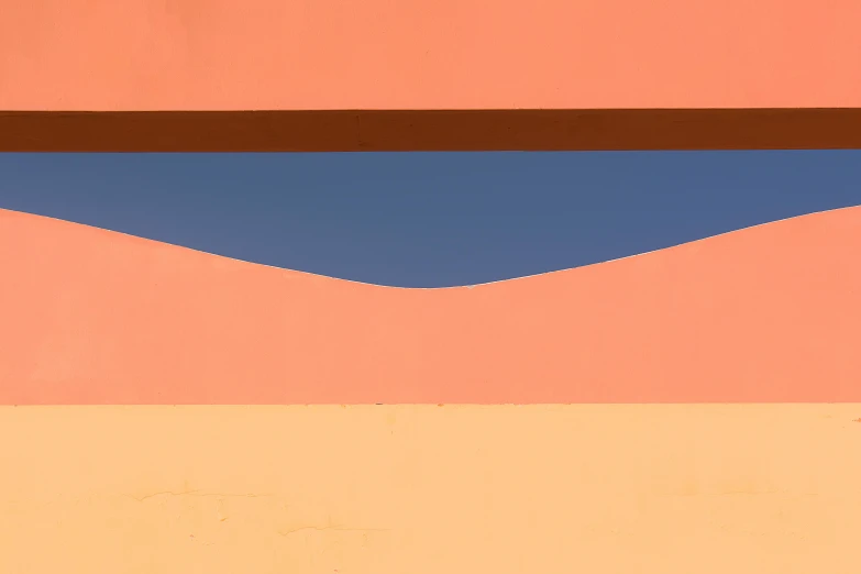 an artistically designed mural in white and brown, orange and blue