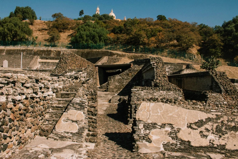 a wall and buildings at a small village